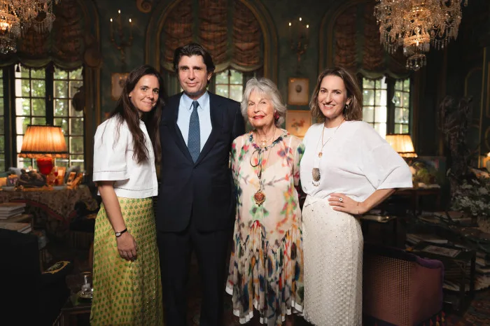 Isabelle d'Ornano in her Paris apartment with (left to right) her granddaughter Daria Botin, her son Philippe and daughter Christine. Jean Picon