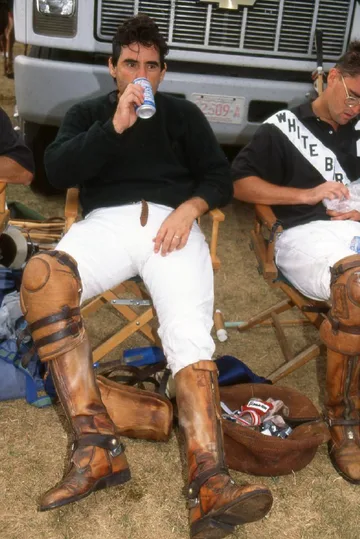 Resting during a polo match.