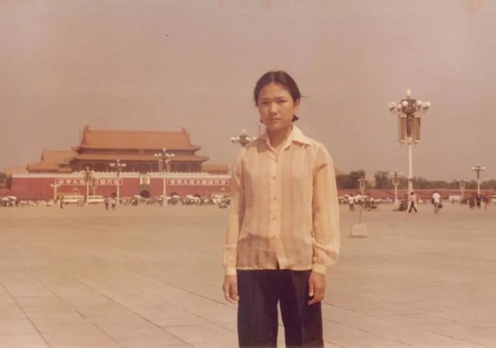Zhang Xin as a child in Tiananmen Square, Beijing.