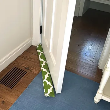 One of the many door stoppers filled by a houseguest.