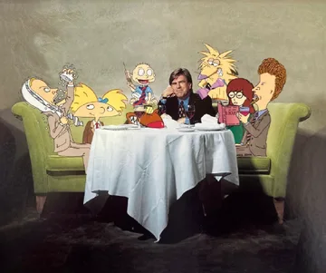 Freston surrounded by the animated characters from some of his networks’ TV shows, including ‘Beavis and Butt-Head,’ ‘Hey Arnold’ and ‘Rugrats.’