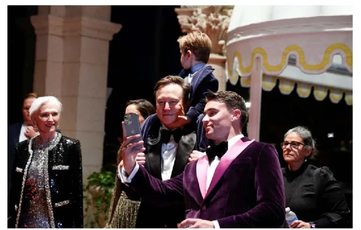 Elon Musk accessorizes with a black tie and son at the Mar-a-Lago New Year’s Eve bash.