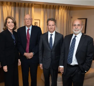 Porat pictured with Henry Paulson, Timothy Geithner and Ben Bernanke.