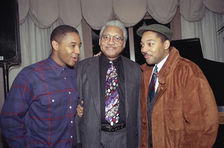 Ellis Marsalis flanked by his sons Branford, left, and Wynton, right, at a party for Ellis’s album “Heart of Stone.” Susan Ragan/AP